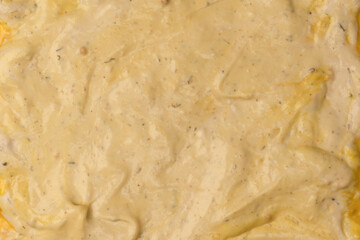 Yellow sauce splashes as a background.