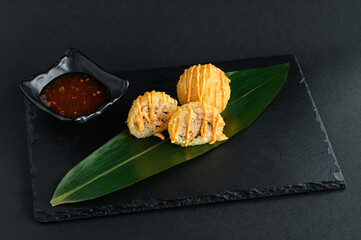 Rice balls filled with salmon, shrimp, and tuna, offering a delicious blend of flavors in every...