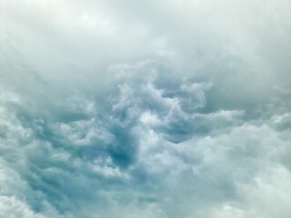 Dark clouds churn in the sky heralding an impending thunderstorm.