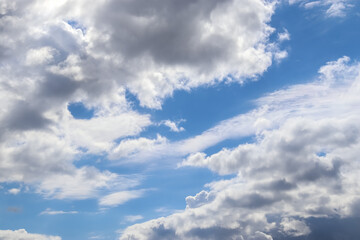 Bright mixed clouds in a summer sky.