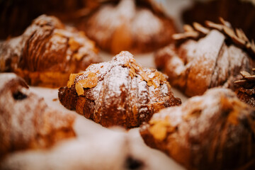Freshly baked croissants await coffee patrons in a cozy cafe setting