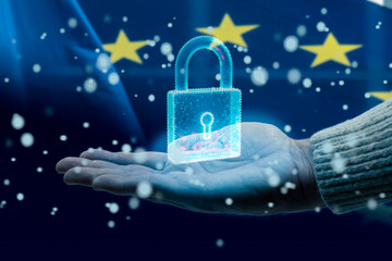 Hand holding hologram of padlock protecting european union data privacy