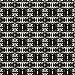 This stylish black floral pattern set against a soothing beige background is absolutely perfect for textiles and design