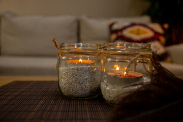Cozy and Inviting Candlelit Decor Featuring Beautiful Glass Jars Alongside Natural Elements