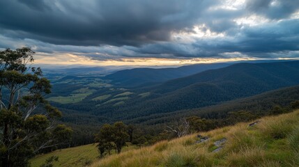 Fototapeta premium Mountain sunset landscape, stormy clouds, valley view, pastoral scene, travel poster