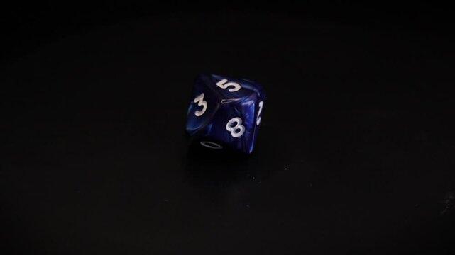 D10 blue Dice isolated 360 rotation black background