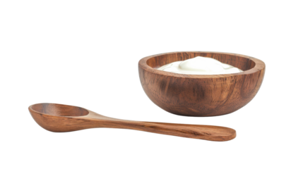 Sour cream in wooden bowl and spoon on transparent background