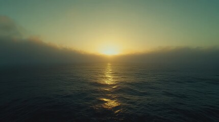 Obraz premium Ocean sunset, misty sunrise, sea fog, aerial view, calm waters, travel backdrop