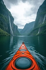 Kayaking in a serene fjord surrounded by majestic cliffs and cascading waterfalls