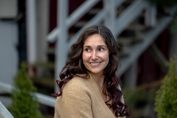 Elegant woman, young woman, portrait, nature, outdoor portrait, natural beauty, elegance, harmony, calm, peaceful, serene, soft light, warm colors, feminine Elegant portrait of a young woman in nature