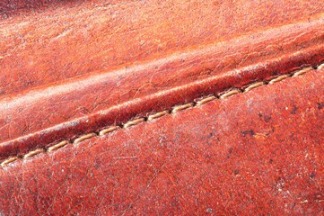 Close up of stitches in old leather