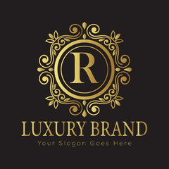 Luxury Ornate Letter Logo with Floral Frame and Dots

