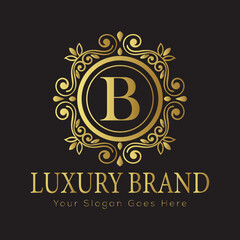 Luxury Ornate Letter Logo with Floral Frame and Dots

