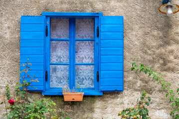 Picturesque view with blue window in Nin. Nin is a small town located near Zadar, dating back to roman times.