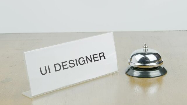 UI Designer Office or Room with Hand Ringing The Bell on Desk or Table Multiple Times
