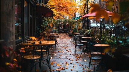 Autumnal Cafe Scene: Parisian Streetside Tables Bathed in Golden Leaves