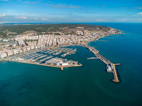 Aerial view of Santa Pola city. Panoramic aerial view of Port of Santa Pola. Costal Mediterranean city and famous travel destination in South of Spain. Panoramic view of all region. Alicante Province
