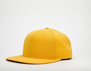 Fototapeta premium Vibrant yellow snapback cap set against a minimalist background, perfect for casual or sporty styles.