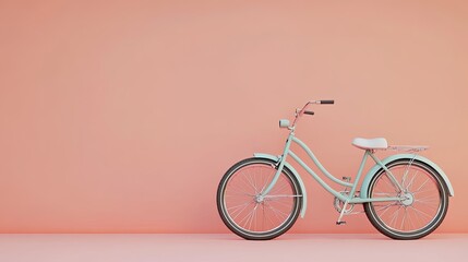 Fototapeta premium Light Green Bicycle Against A Peach Wall Background