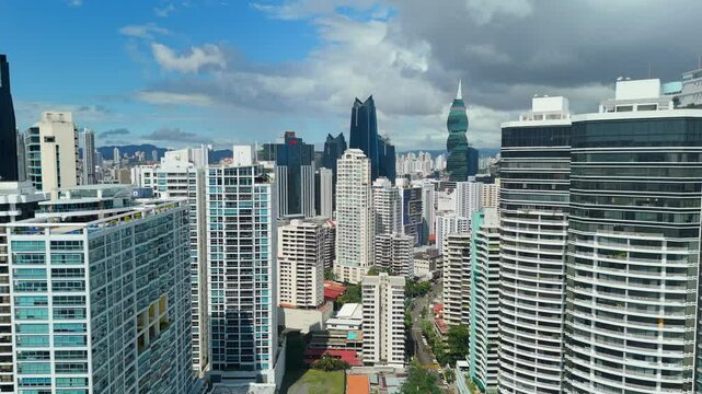 Aerial view of the Panama City skyline from the coastal strip on a sunny day at low tide, Panama.