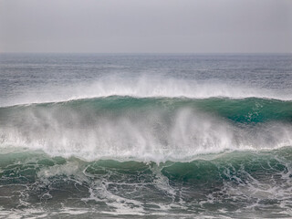 Breaking wave with spray