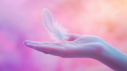 An open palm with a feather floating above it in pleasant pastel tones.