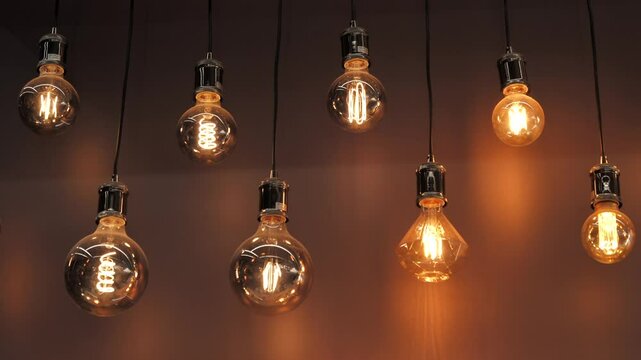 Unusual shapes of light bulbs, chamber lighting, a garland of modern lamps
ulbs illuminates the room with various warm tones, adding charm and elegance to contemporary interior design.