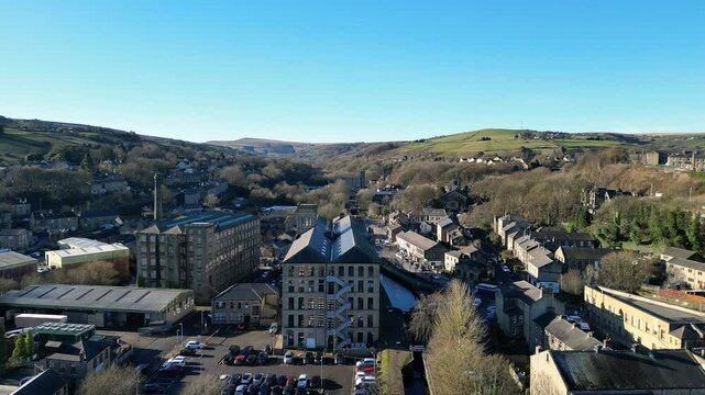 Drone pullback of Spa Mill and Huddersfield Narrow Canal, Slaithwaite, Huddersfield, West Yorkshire