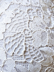 White openwork fabric. Texture white fabric with openwork pattern