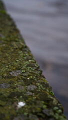 Concrete river fence. The diagonal line. Minimalism
