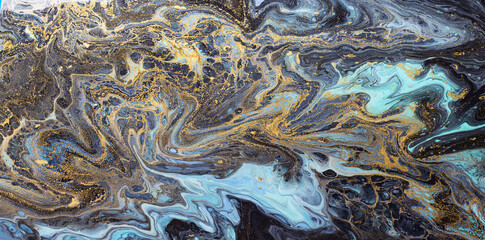 Abstract Marble art background in blue shades with golden splashes.