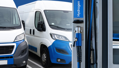 Hydrogen filling station on a background of vans
