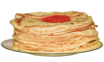 a stack of pancakes with red caviar on a transparent plate