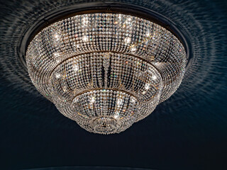 An Elegant Crystal Chandelier With Sparkling Details, Perfect For Any Luxurious Space