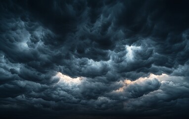 Dramatic dark storm clouds fill the frame, ominous and intense.