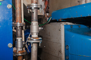 Welded steel pipes with flanges for cooling the main engine on a ship.