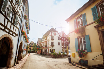 Scenic, sunny street in a picturesque European village Eguisheim