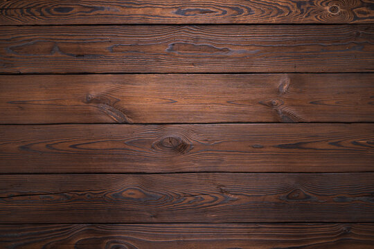Dark Brown Wooden Plank Background with Visible Grain Texture and Details