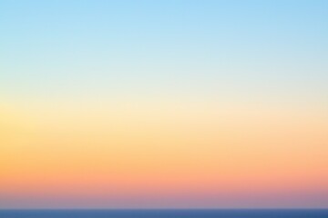 Sunset Gradient: A sky transitioning from deep orange to soft pink, with the horizon fading into a calm, dusky blue