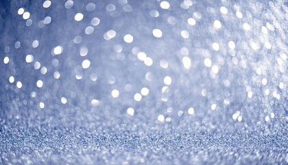 Fototapeta premium shimmering silver and blue bokeh background with sparkling light reflections, perfect for elegant festive or winter designs