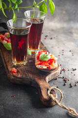 Bruschetta tomato fresh aperitif appetizer tasty food dish gourmet food background on the table...