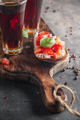 Bruschetta tomato fresh aperitif appetizer tasty food dish gourmet food background on the table rustic food top view copy space vegetarian vegan food