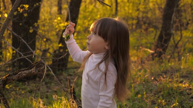 child kid baby girl forest. the highlight of her day was exploring, bare toes wiggled in the dirt, it was a day of endless exploration, an insect buzzed in the distance, laughter echoing under
