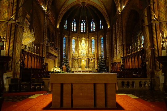 Close up of festive Christmas decoration on the golden altar of the historic Matthias church of Budapest, Hungary 