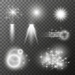 Set of glowing elements, flashes, stars, circles, spotlights on a transparent background