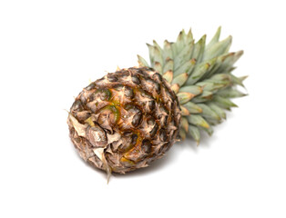 A pineapple is shown on a white background