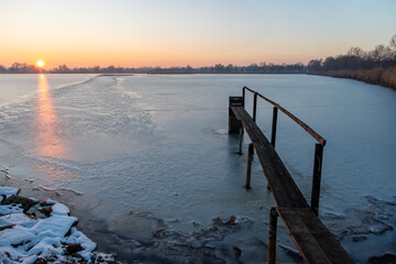 Breeding pond and reeds at sunset © Stanislawski