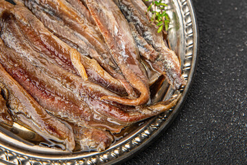 Anchovy fillet fish seafood snack aperitif fresh tasty food dish gourmet food background on the table rustic food top view copy space pescetarian diet