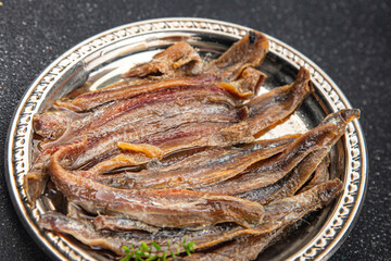 Anchovy fillet fish seafood snack aperitif fresh tasty food dish gourmet food background on the table rustic food top view copy space pescetarian diet