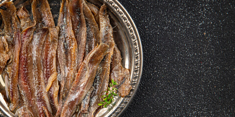 Anchovy fillet fish seafood snack aperitif fresh tasty food dish gourmet food background on the table rustic food top view copy space pescetarian diet